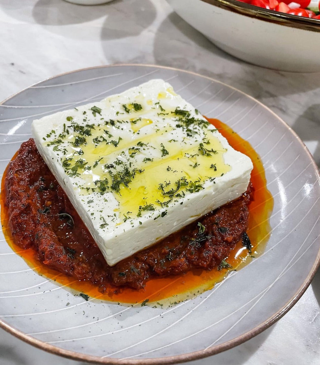 Feta with Harissa, Sun-Dried Tomato and Roasted Red Pepper Sauce