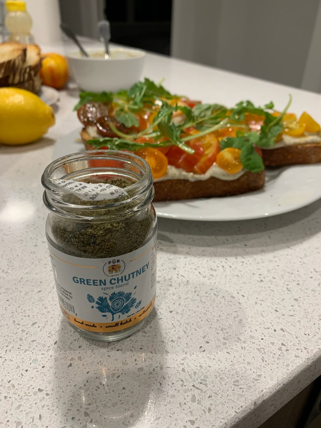 Summer Tomato and Garlic Toast with Green Chutney Tahini and Arugula Salad